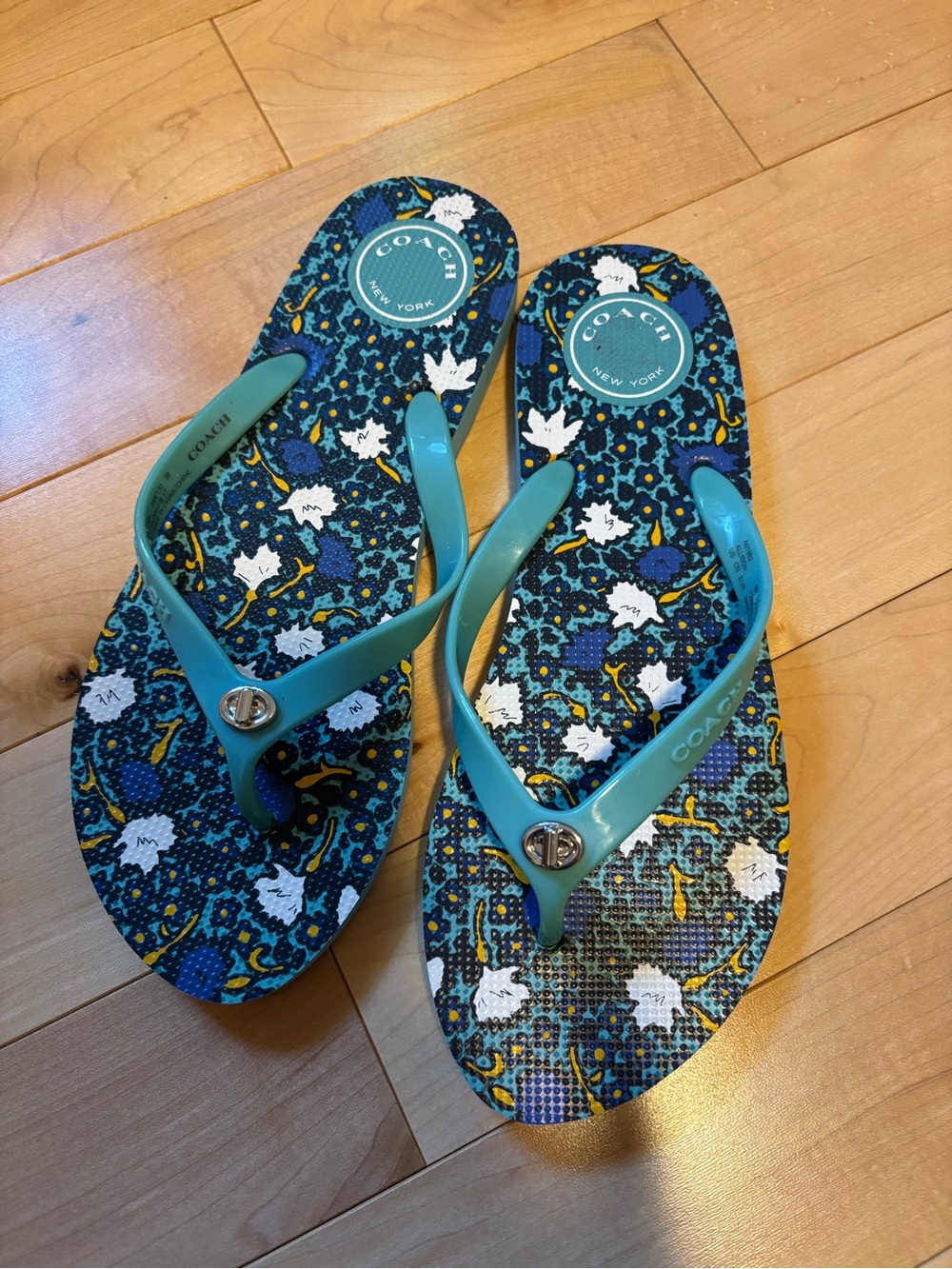 Coach Teal Floral Logo Flip Flops
